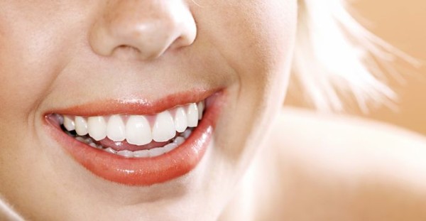 16. How do you get white teeth naturally